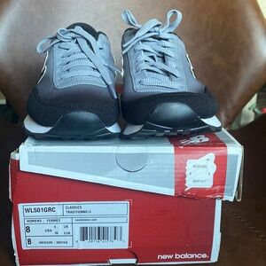 New balance women shoes size 8 black with grey ombré. Brand new with box.